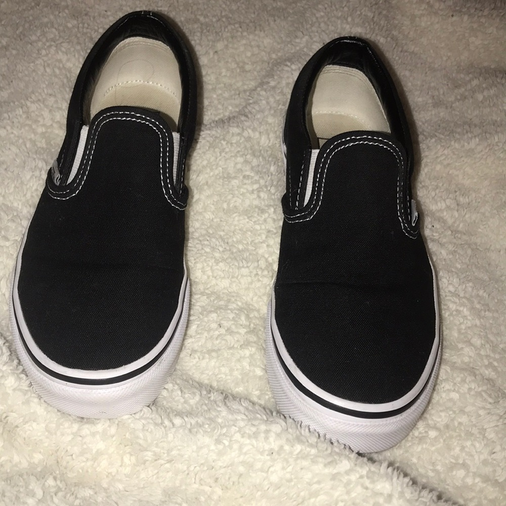 NWOT BLACK AND WHITE SLIP ON VANS